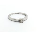 A 9carat white gold ring set with a brilliant cut