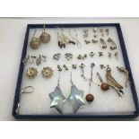 A collection of approx 21 silver earrings.