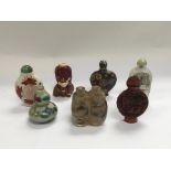 Seven Oriental scent bottles.