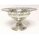 A Silver comport dish with a pierced rim and circu