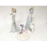 Three Royal Doulton figures two from the Reflectio