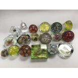 A collection of approx 18 glass paperweights inclu
