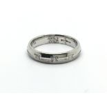 A 9carat white gold modern design ring set diamond