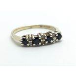 A 9ct gold sapphire and diamond ring, approx 2.2g