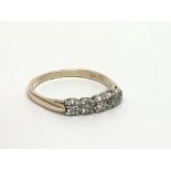 A 14ct gold five stone diamond ring, approx .25ct,
