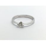 An 18ct white gold solitaire diamond ring, approx