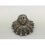 A rare Victorian silver brooch in the form of a pi