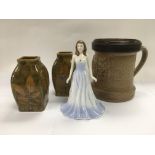 A Doulton tankard, figure and a pair of vases (4).