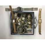 A collection of vintage watches and coins.