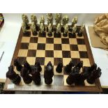Included is a chess set, missing 2 pieces.