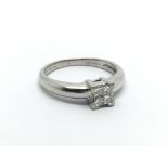 A Platinum ring set with princess cut diamonds app