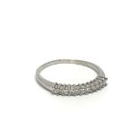 An 18ct white gold eleven stone diamond ring, appr