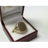 A heavy 9ct gold gents signet ring. V, approx 14g.