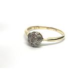 A vintage 18ct gold seven stone diamond ring in th