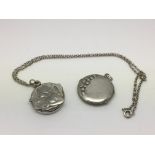 An Art Nouveau silver fronted locket plus one othe