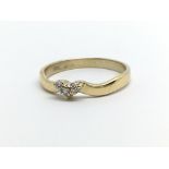 A gold plated silver three stone ring, approx size