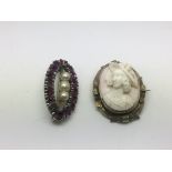 A sterling silver brooch and a cameo brooch set in