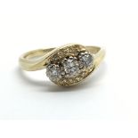 An 18ct gold three stone diamond ring, approx.30ct