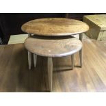 A nest of two Ercole pebble tables.