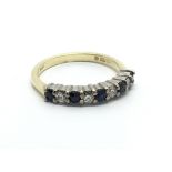 An 18carat gold ring set with alternating sapphire