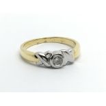 An 18carat gold ring set with a solitaire diamond