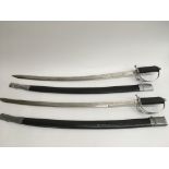 Two replica Indian army swords and sheaths.