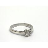 A 9ct white gold solitaire diamond ring, approx 1/