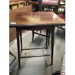 An Edwardian inlaid Mahogany card table with satin