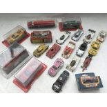 A box containing a collection of Diecast vehicles