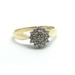 A 9ct gold diamond cluster ring, approx 2.9g and a