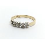 A 10ct gold five stone diamond ring with each ston