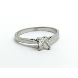 An 18ct white gold solitaire diamond ring, approx