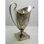 A silver jug, Birmingham 1930, approx height 14cm.