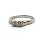 An 18ct gold three stone diamond ring, approx.15ct