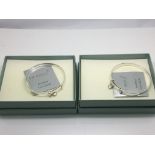 Two brand new and boxed designer silver and diamon