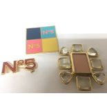 Three Authentic Chanel brooches No 5 and one other