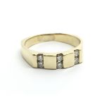 A 14carat gold ring set with six brilliant cut dia