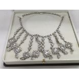 A boxed sterling silver necklace set with CZs.