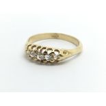 A vintage 18ct gold dive stone diamond ring set wi