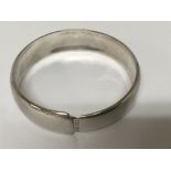 An Authentic Chanel silver bangle diameter 7cm.