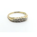 A vintage 18ct gold dive stone diamond ring, appro