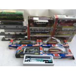 A collection of boxed Diecast vehicles including b