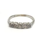 A vintage 18ct white gold five stone diamond ring,