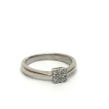 A 9ct white gold nine stone diamond ring, approx.1
