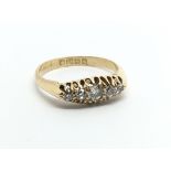 A vintage 18ct gold dive stone diamond ring, appro