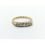 A Vintage 18carat gold ring set with a pattern of