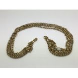 A 9ct gold long guard chain, approx 16.9g.