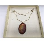 A signed Limoges enamel pendant on a 9ct gold chai