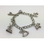 A child's silver charm bracelet - NO RESERVE