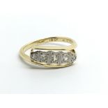 An 18carat gold ring set with five diamonds. Ring